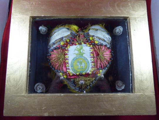 Framed Victorian Period Heart-Shaped Sweetheart Pincushion with the emblem for The Duke of Wellington’s Regiment