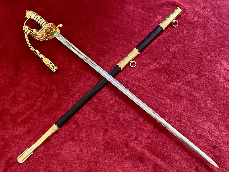 Near Mint ERII Royal Navy Officer’s Sword by Wilkinson Sword with Scabbard and Dress Knot c1979