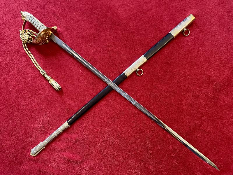Near Mint ERII Royal Navy Officer’s Sword by FIRMIN AND SONS PLC with Scabbard and Dress Knot c1980