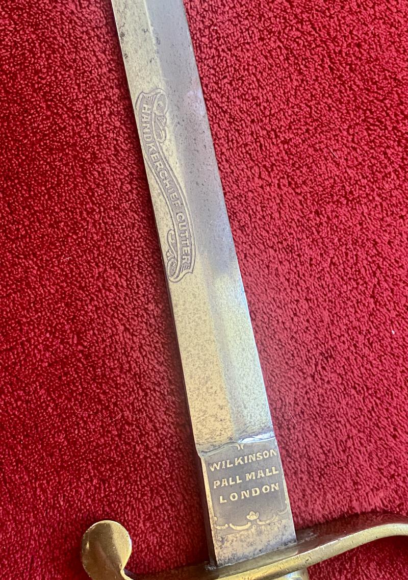 Scarce Handkerchief Cutter Sword with 33” Long Thin Curved Blade and Leather Covered Scabbard by Henry Wilkinson - Engraved with RUDGE Family Crest