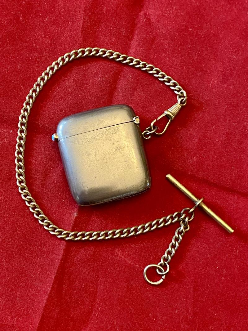 Antique Gunmetal Vesta Case set with a Turquoise Cabochon in a Gold Collar along with a Brass Pocket Watch Chain