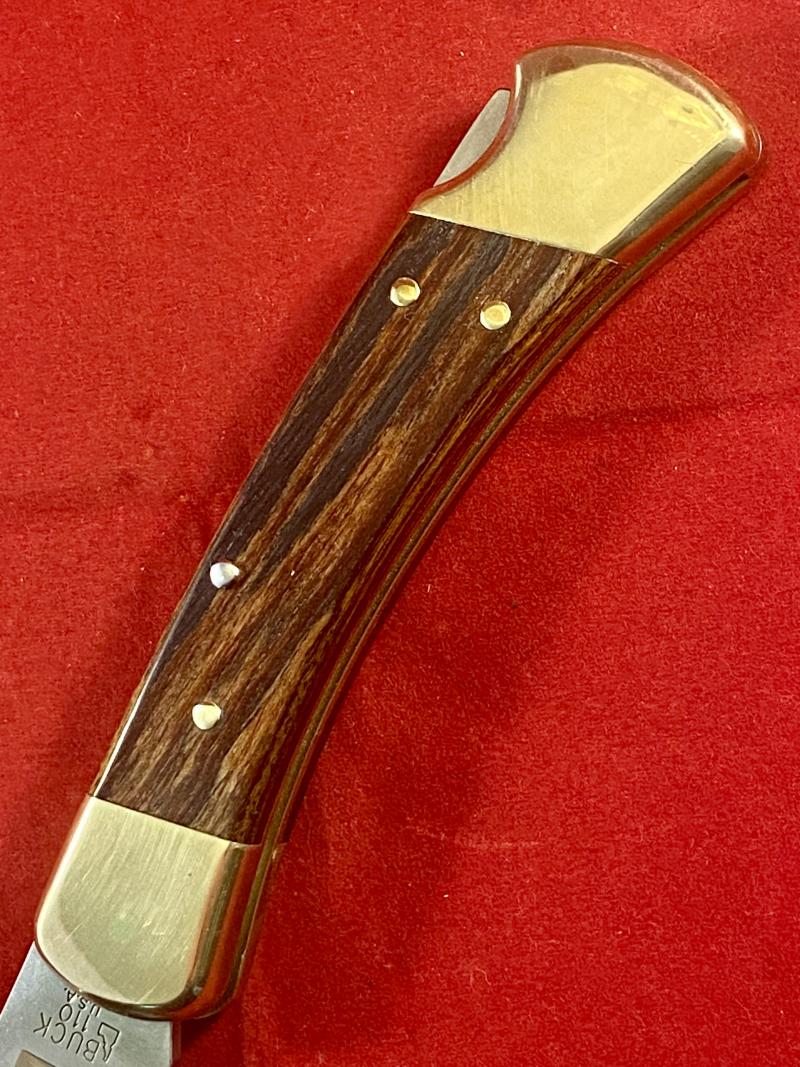 Mint BUCK 110 Lockback Knife with Scarce “Idaho” Mark dating it to 2005