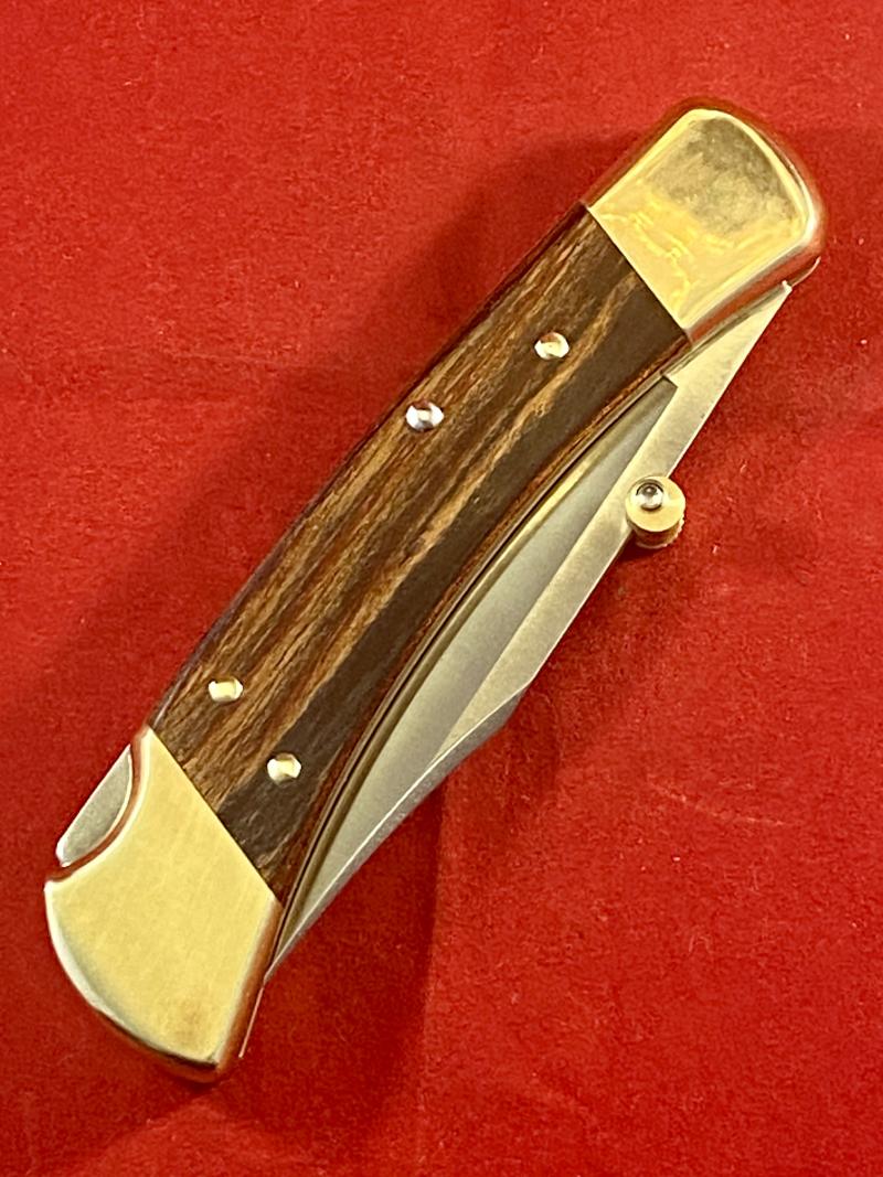 Mint BUCK 110 Lockback Knife with Scarce “Idaho” Mark dating it to 2005