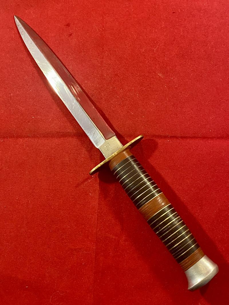 Vintage Commando Style Knife with Stiletto Blade, Stacked Brass and Leather Grip and Custom “Indian Chief” Leather Sheath