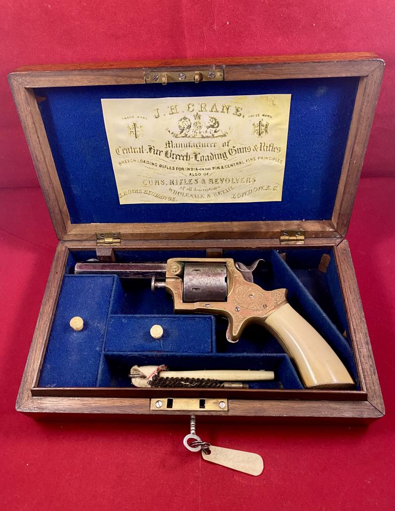 Scarce Deluxe Version of a Tranter Patent 7-Shot .32 Rimfire Revolver Retailed by J.H. Crane London with Tools in Fitted Burr Walnut Case c1865